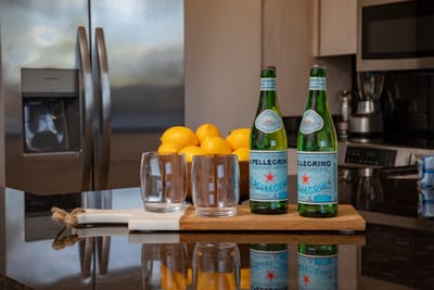 Begin your stay with a sparkle, cool drinks, sunny lemons, and a kitchen designed for comfort, calm, and connection KGV-20T2