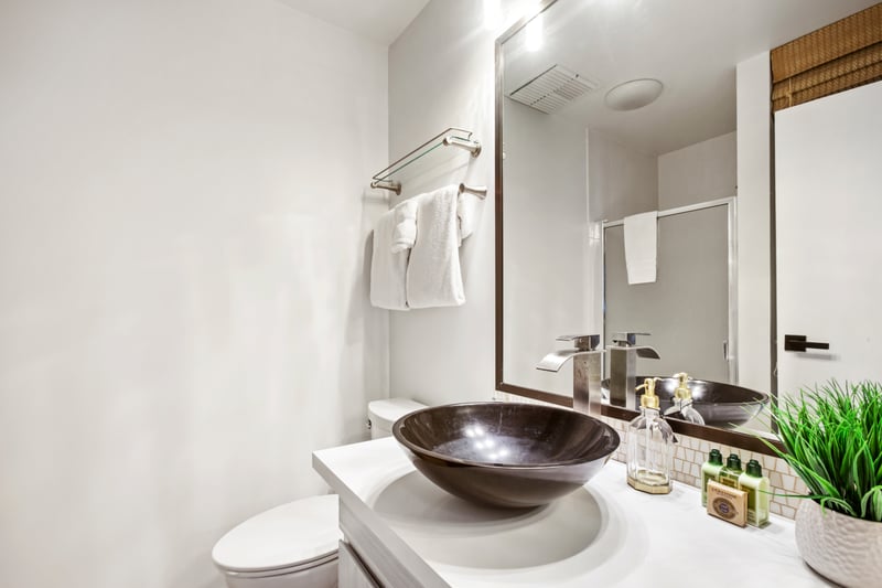 Elegance in every detail, from the spacious vanity to the artfully tiled shower, this guest bath is crafted for serene Maui stays