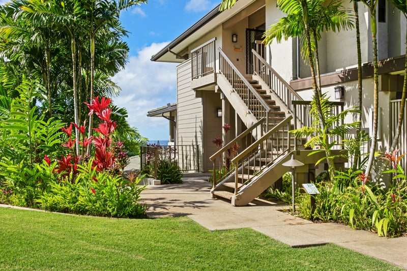 Tropical welcome awaits, your private entrance is framed by lush greenery, colorful flora, and island charm    KGV-20T2