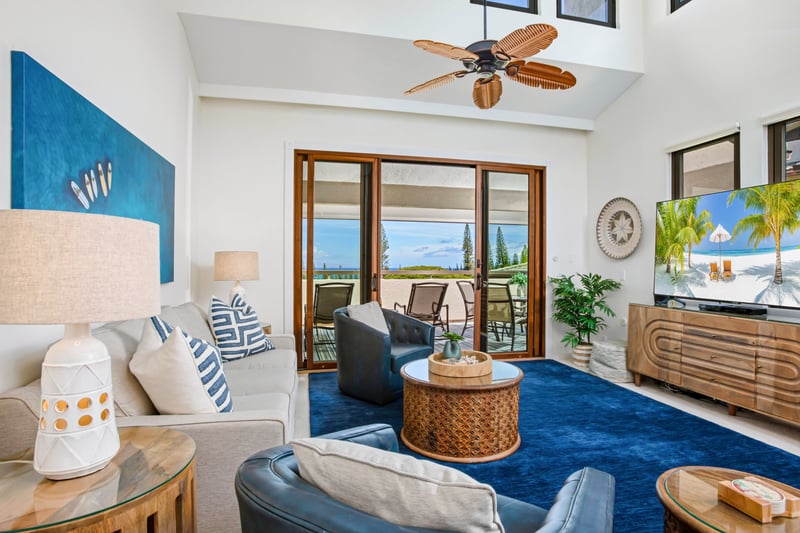 A bright and stylish living room with coastal décor and plush seating. KGV-20T8