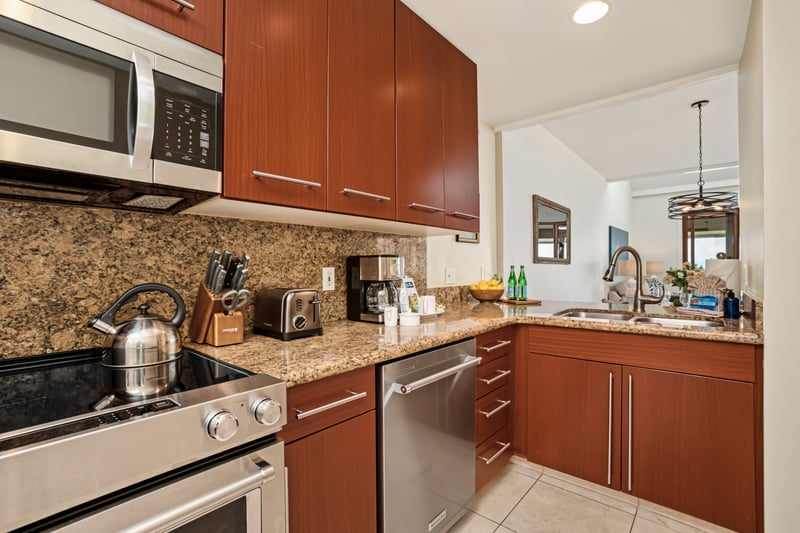 Gourmet-ready kitchen with rich cabinetry and gas range. KGV-20T8