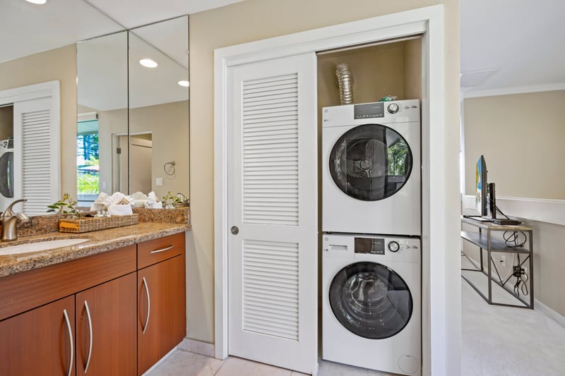 Modern washer and dryer tucked conveniently in a laundry nook. KGV-20T8