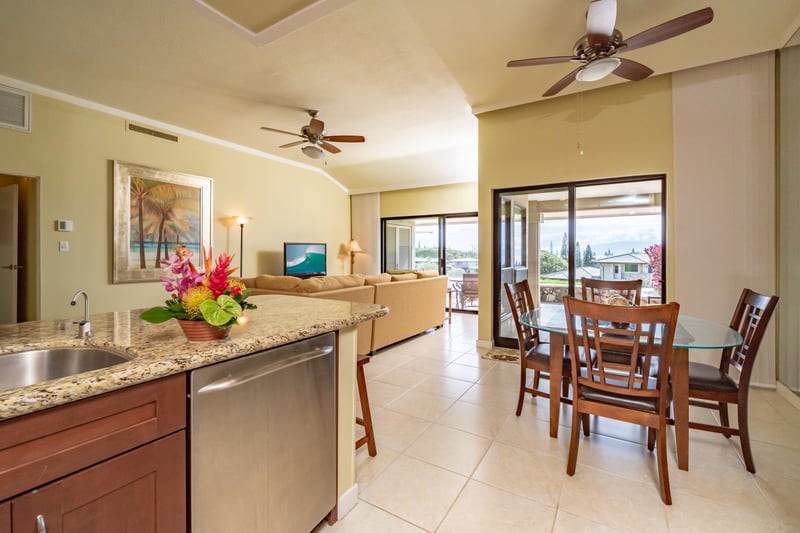 Large windows and patio access bring in natural light for a relaxed, airy dining experience KGV-21P2