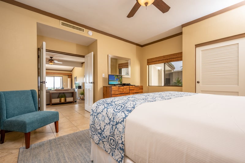 Where relaxation meets design—this master suite blends earthy tones, tropical touches, and comfort you’ll want to take home
