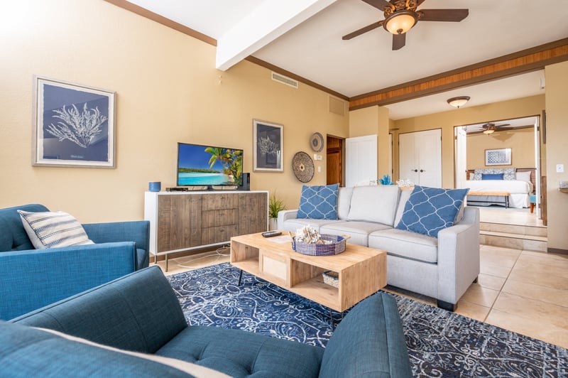 Cushions invite, the rug softens each step, and the dining table waits—ready for long meals and even longer conversations