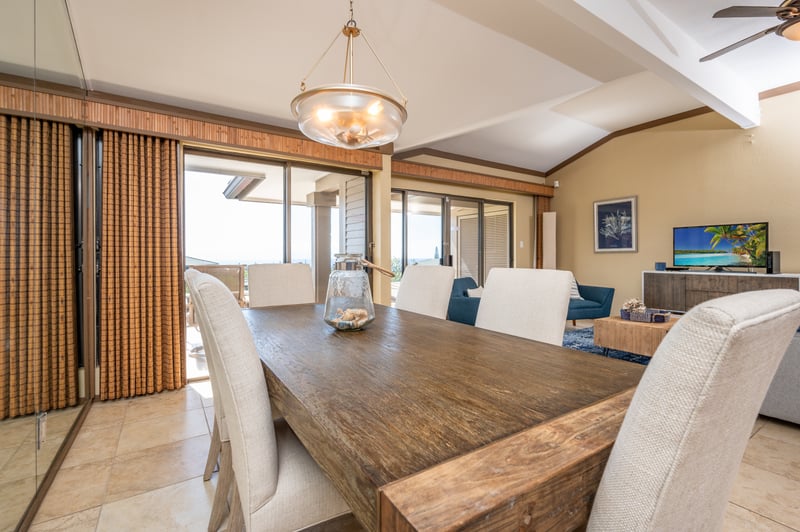 Share unforgettable meals in this charming space where natural wood textures meet soft neutral tones and warm lighting