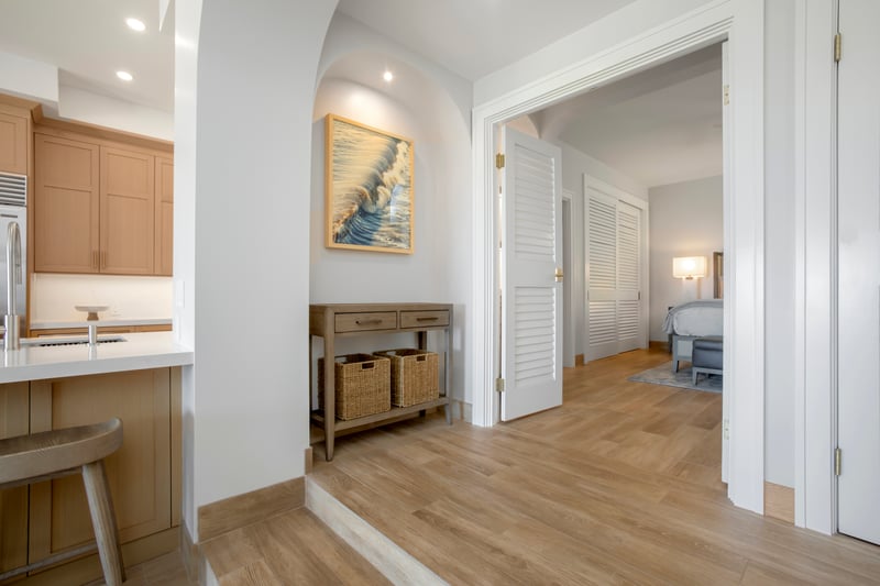 Feel instantly at ease in this beautifully curated space—where airy arches, soft textures, and warm wood invite rest     KGV-22P2