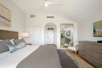 Tucked inside this breezy oasis is a bed so plush and polished, it might just cast a sleep spell on your entire stay