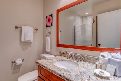 Every stay deserves a little indulgence—this tranquil bathroom wraps you in warmth, ease, and subtle sophistication