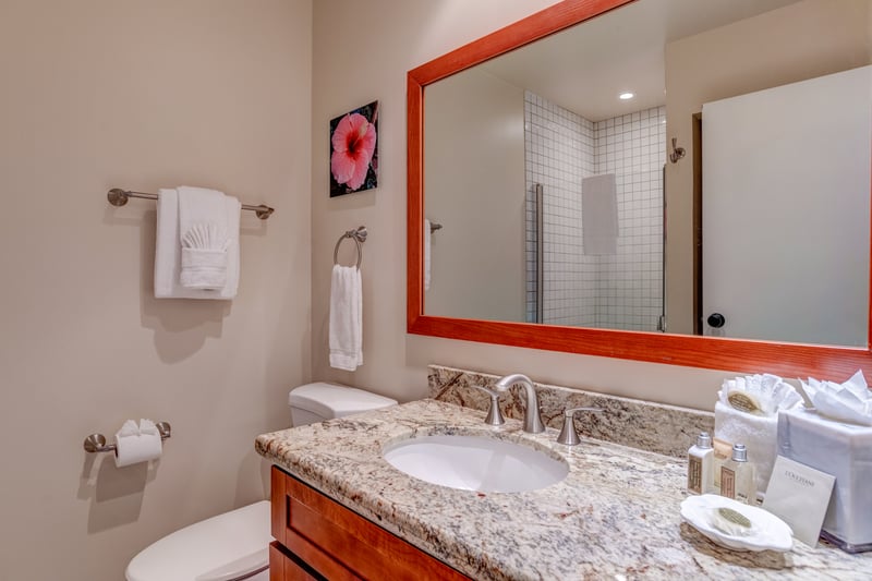 Every stay deserves a little indulgence—this tranquil bathroom wraps you in warmth, ease, and subtle sophistication