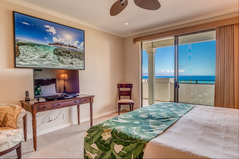 Step into island serenity in this oceanview suite, where lush accents and private lanai access invite peaceful moment
