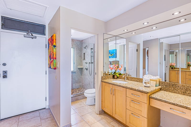 Whether prepping for the day or unwinding after an adventure, this calming bathroom blends natural textures with effortless elegance