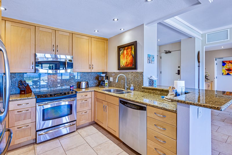 Custom cabinetry and full-size appliances throughout this gourmet kitchen.    
