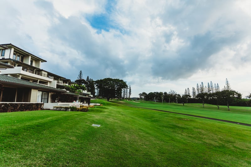 A tapestry of green fairways and slender pines creates a timeless backdrop for leisurely mornings and scenic evening strolls    