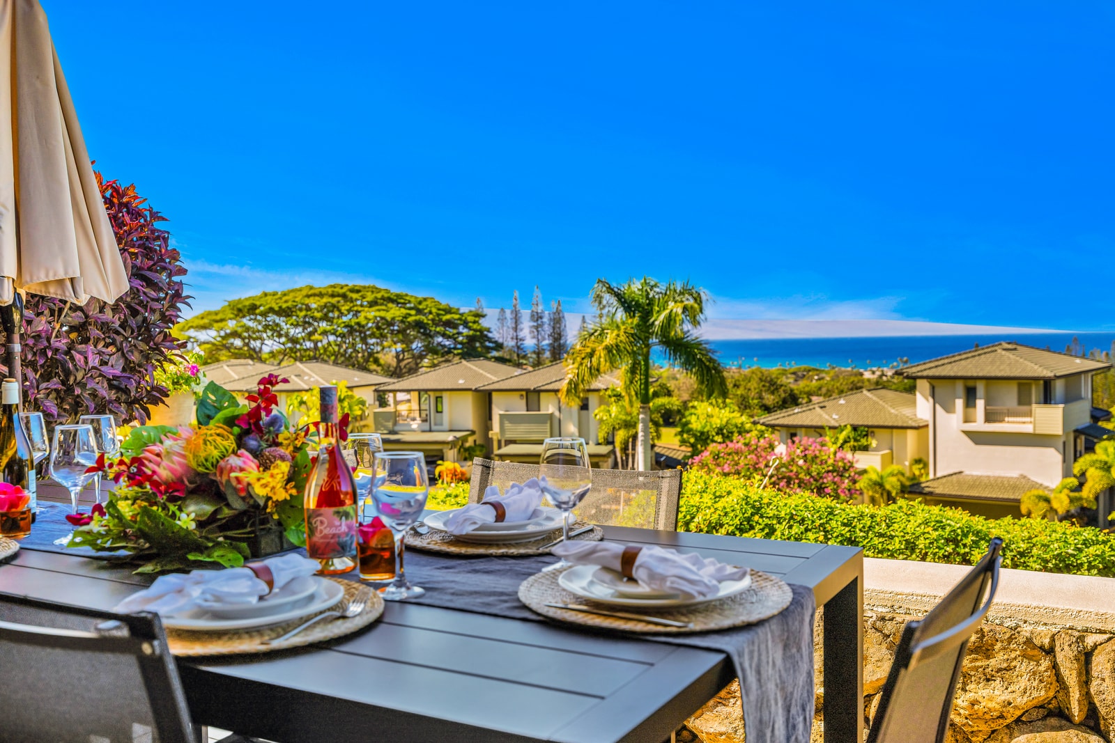Set the table for an alfresco dinner overlooking tropical gardens and ocean views. KGV-24P7
