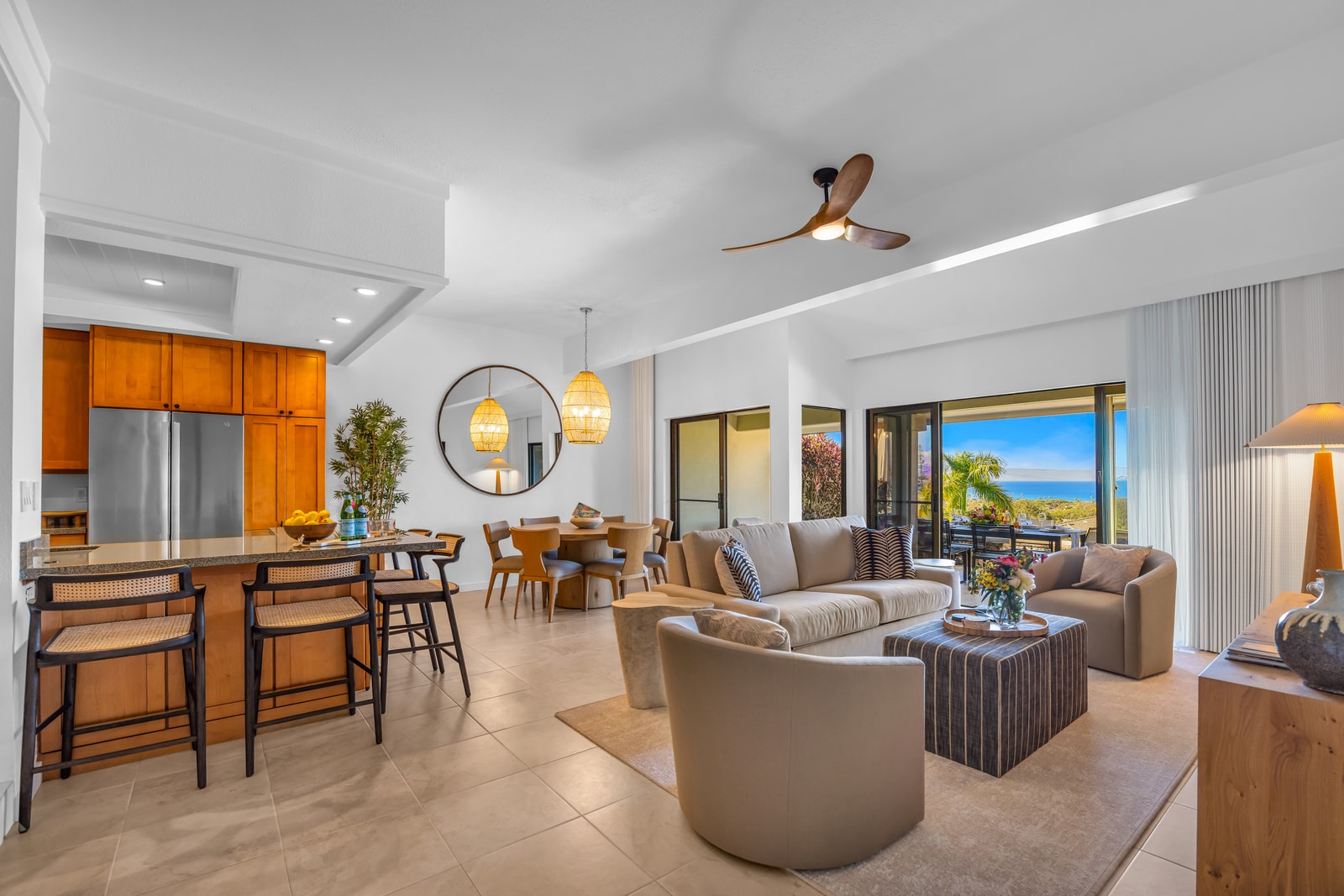 An open layout connects the living area, dining space, and kitchen for easy gathering and conversation. KGV-24P7