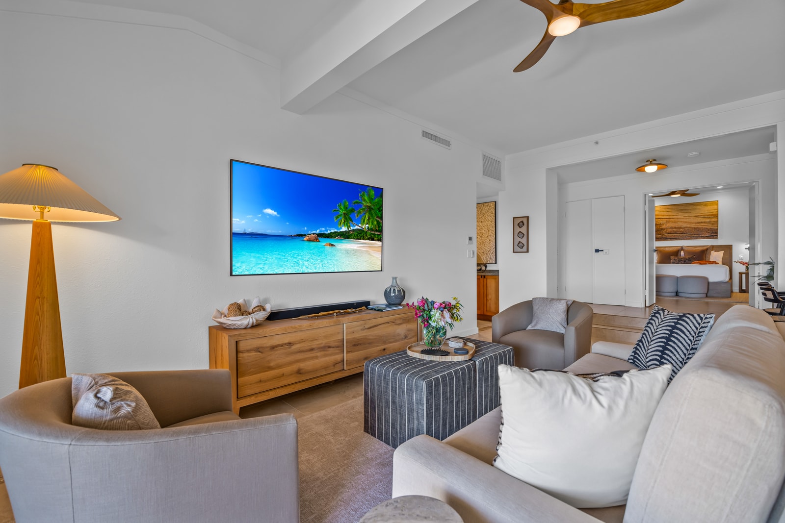 Unwind with your favorite show in the living area featuring a Smart TV and relaxed seating. KGV-24P7