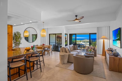 Comfortable seating and island-inspired decor set the tone for laid-back evenings together. KGV-24P7