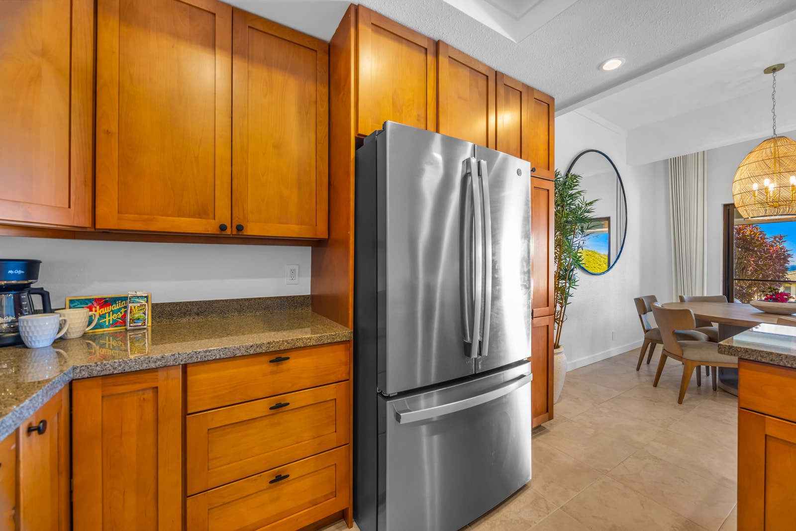 Plenty of cabinetry and modern appliances make island meals simple to prepare. KGV-24P7