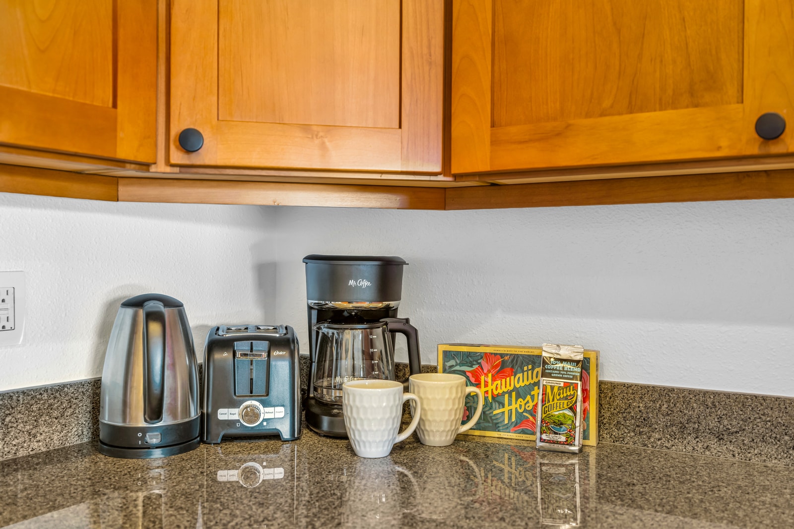 Start your morning with coffee using the kitchen counter setup and small appliances. KGV-24P7