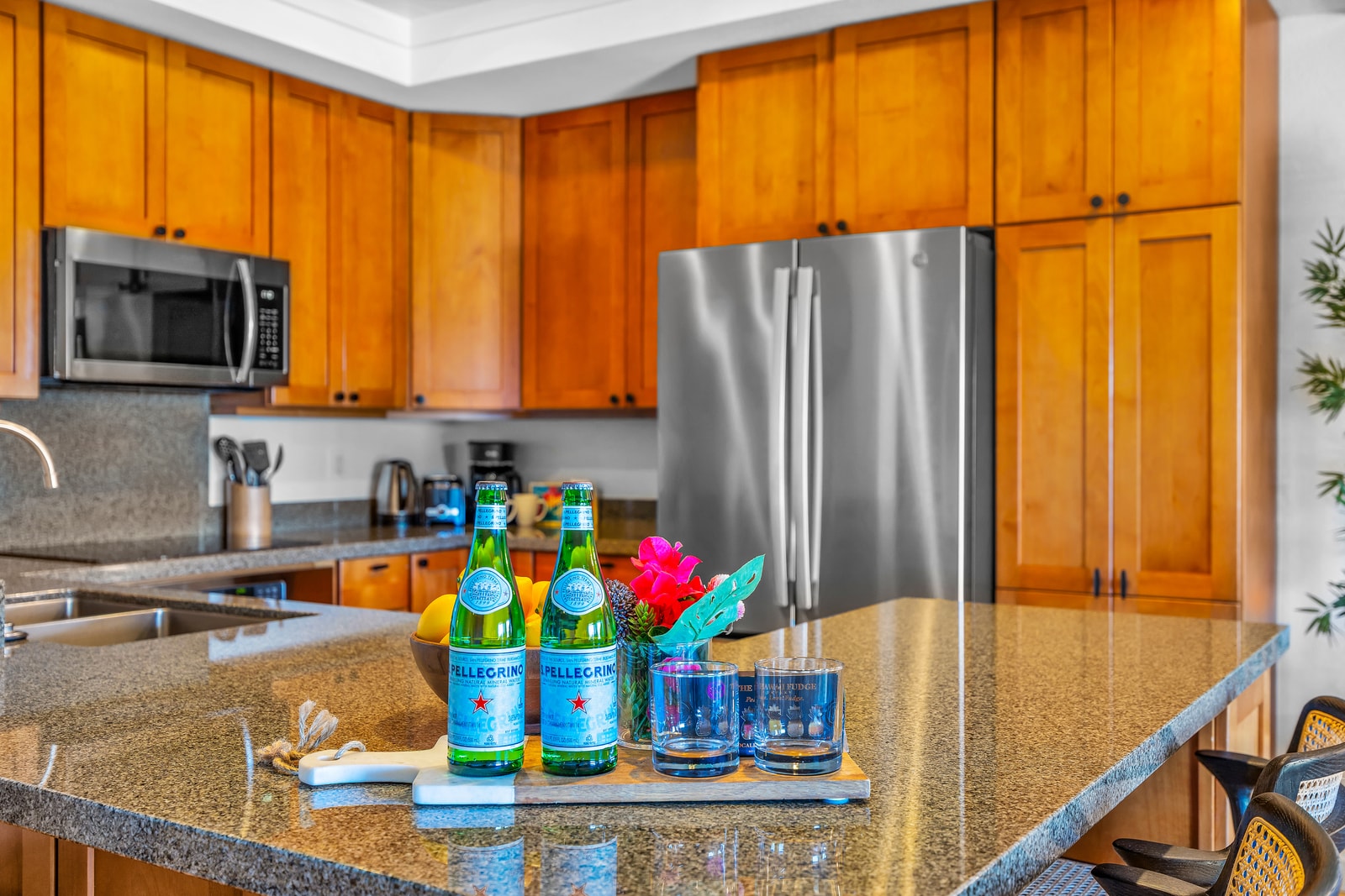 Mix drinks or prep appetizers at the island with the kitchen fully stocked for your stay. KGV-24P7