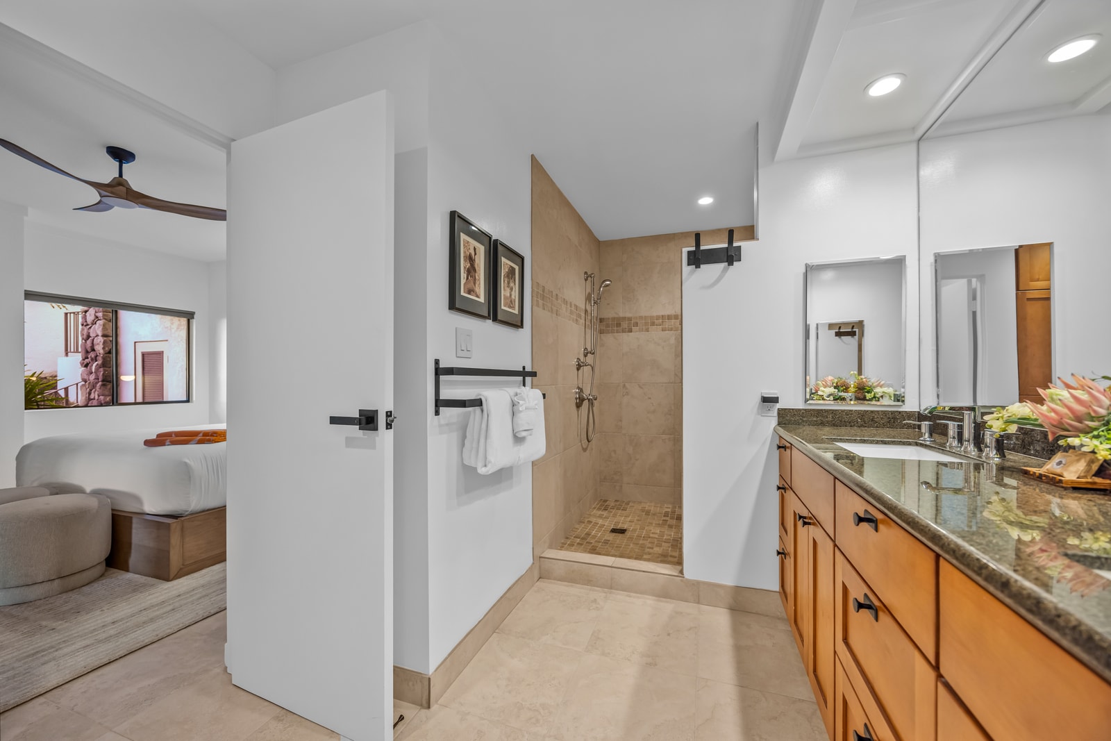 The ensuite bath includes a walk-in shower and convenient bedroom access. KGV-24P7