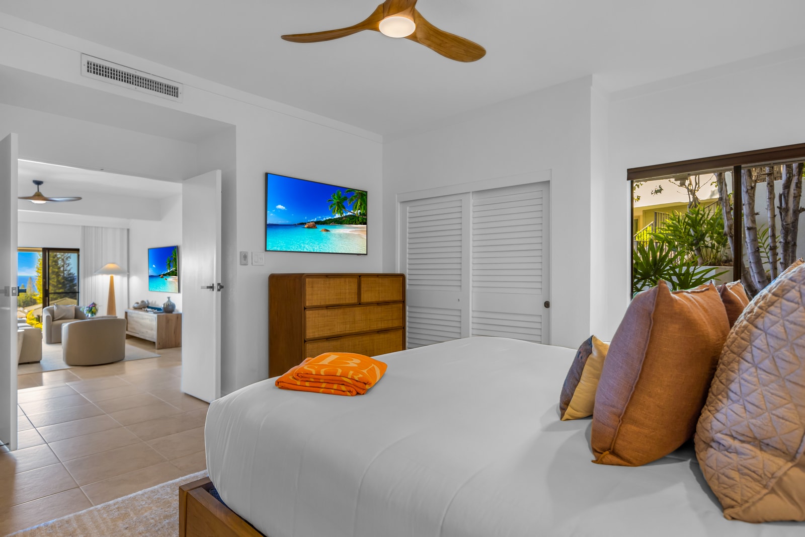 A bright guest bedroom layout keeps sleeping space private and quiet. KGV-24P7