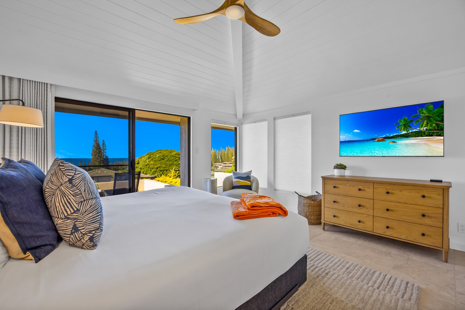 Unwind in the primary bedroom with a King bed and Smart TV for evening entertainment. KGV-24P7