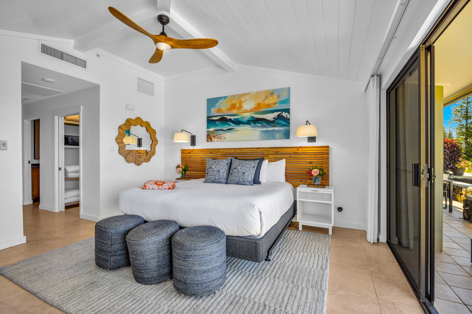 The spacious primary bedroom offers a flexible setup that can be arranged as one King or two Twins before arrival,  also blending comfort with direct access to the lanai. KGV-24P7