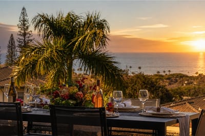 Gather for sunset drinks on the lanai with a spacious dining table and peaceful resort and ocean views. KGV-24P7
