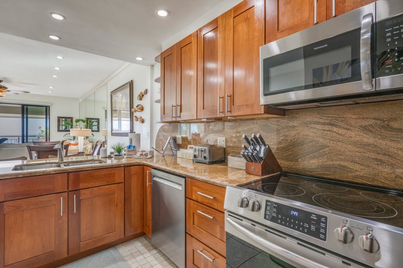 Welcome to your vacation command center—where countertops curve like waves and snacks magically replenish themselves