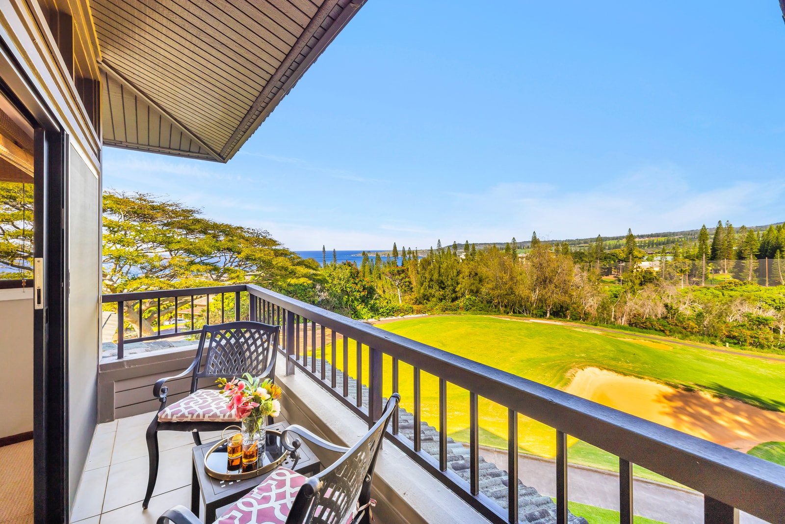 The bedroom features a private lanai, the perfect place to relax and enjoy the views