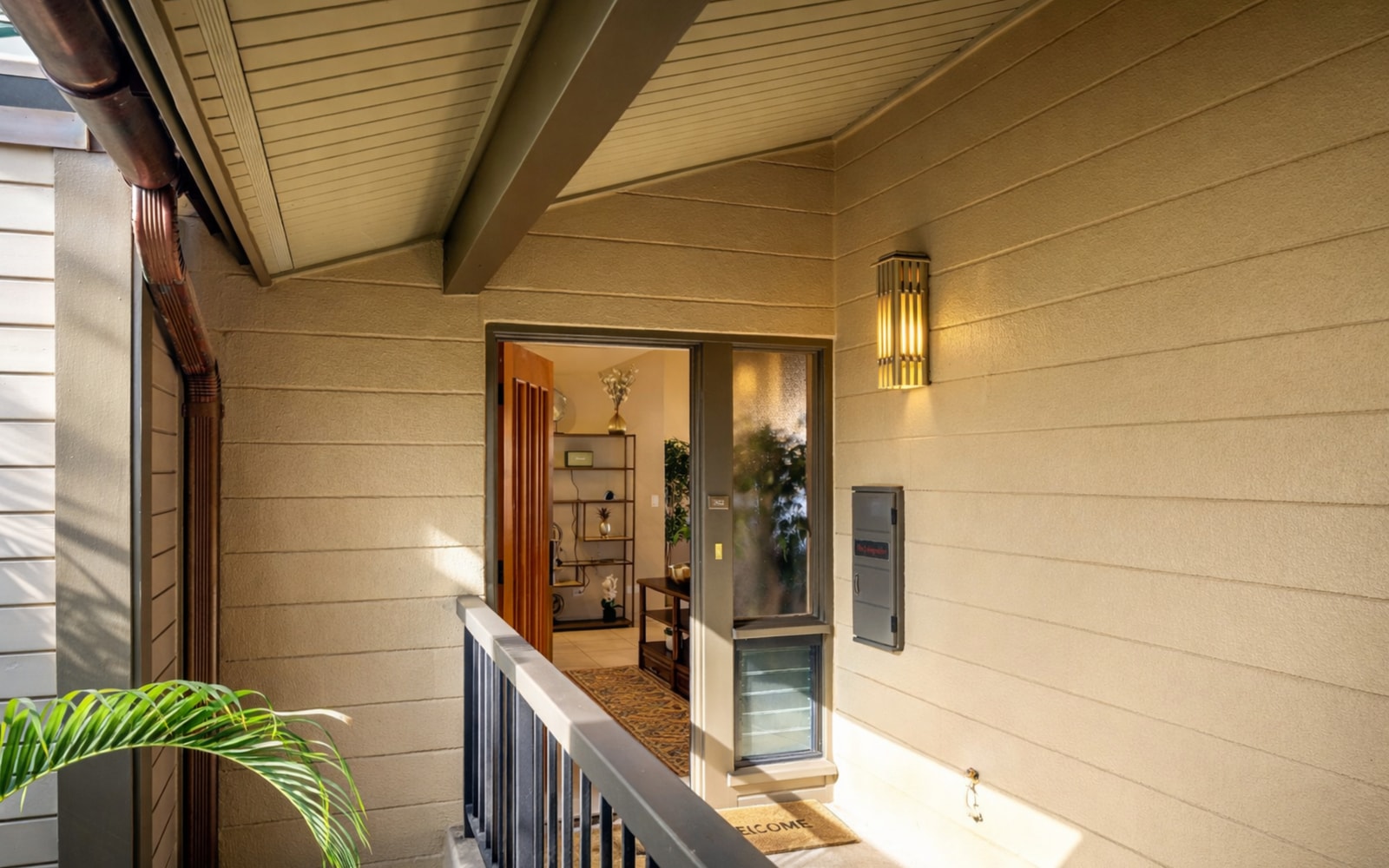Peaceful covered entry that sets the tone for your stay