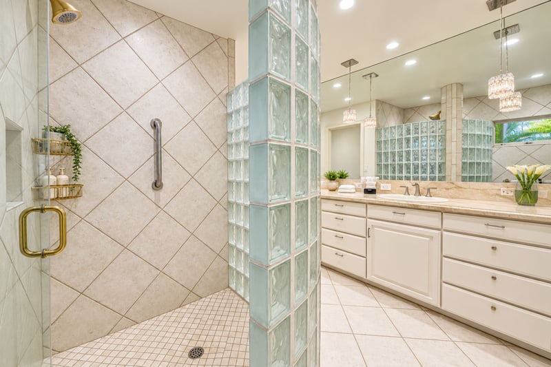 Spa style glass block shower, a striking architectural feature in the primary ensuite bath.