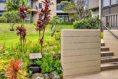 Landscaped paths and tropical flowers welcome you back to your peaceful Maui retreat.