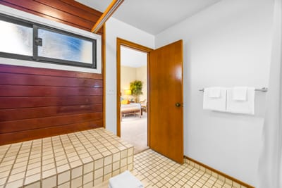 Bright and clean, the guest bath offers everything you need for a comfortable stay.