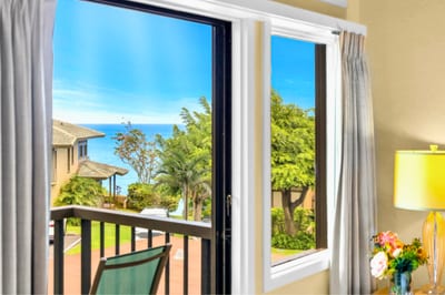 Enjoy garden and ocean views right from bed or while lounging by the window.