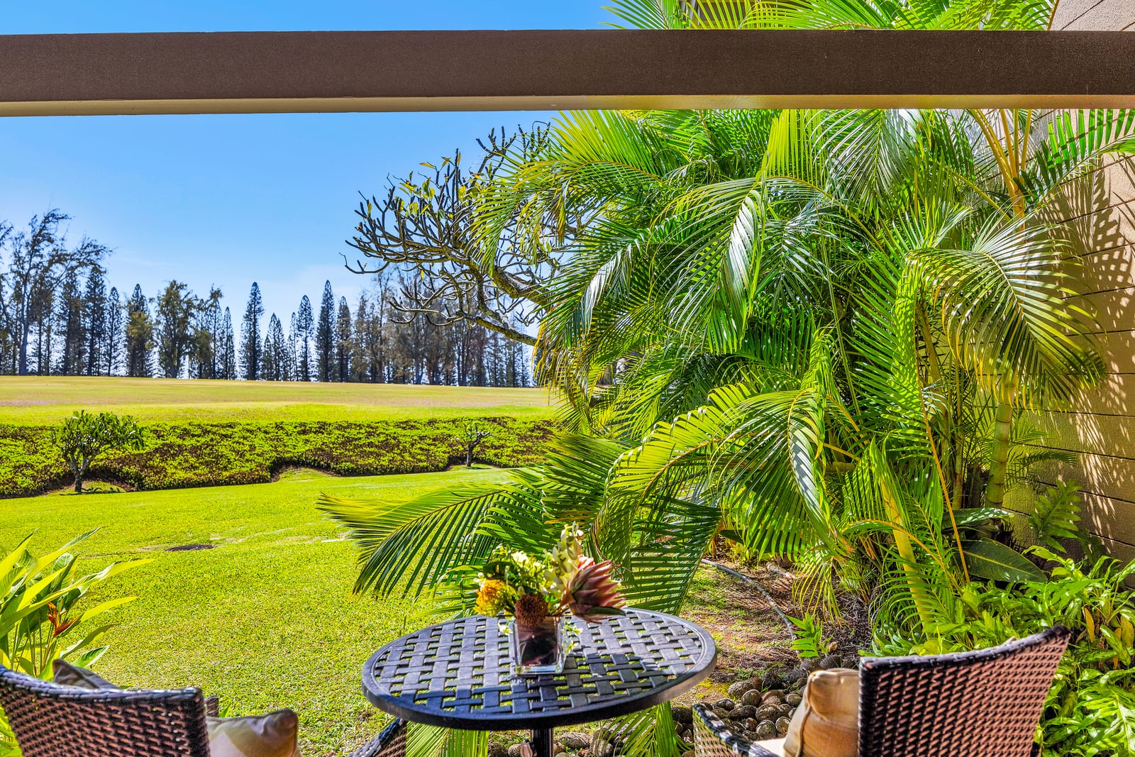 Relax on the lanai surrounded by lush tropical landscaping