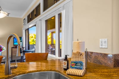 The kitchen opens to the living area, keeping meals and conversation flowing effortlessly.
