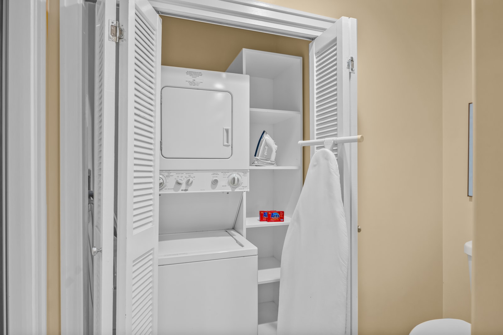 In-unit laundry makes long stays easy with a stacked washer and dryer in the hall closet.