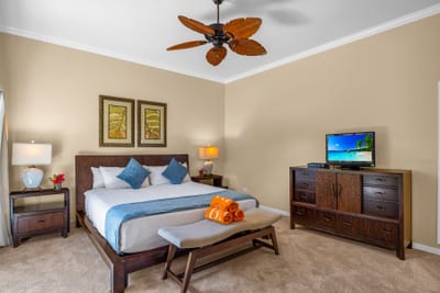 Relax in your King bed with a partial ocean view and easy access to the ensuite bath.