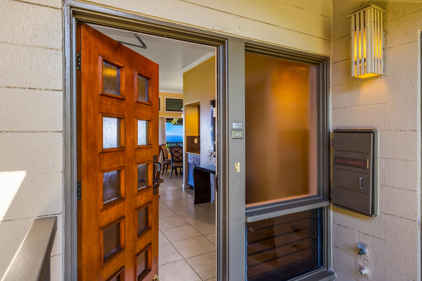 A warm welcome begins at your front door with island charm and open-concept entry.