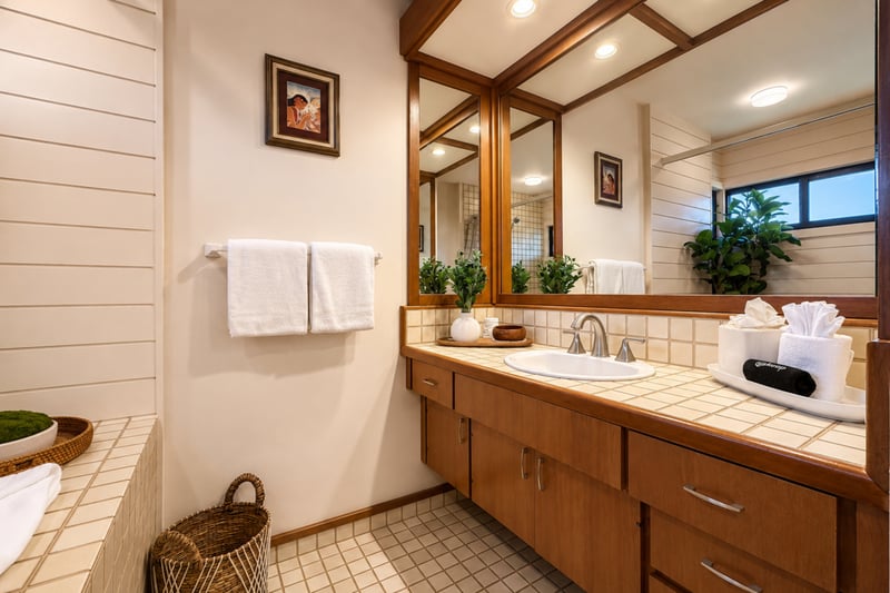 Spacious vanity with double mirrors and fresh towels