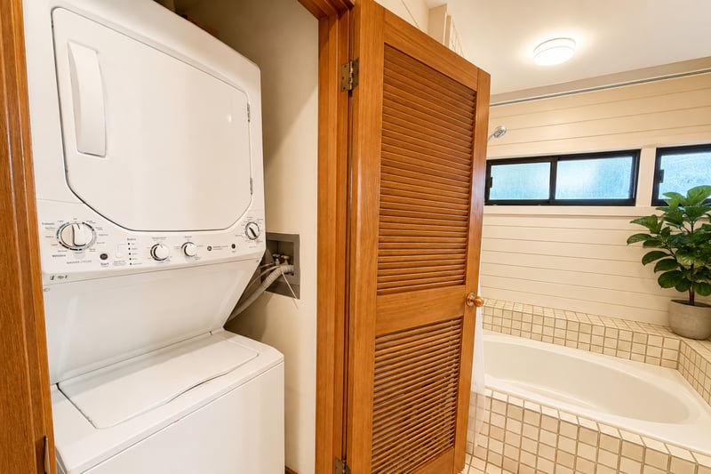 In-unit stacked washer and dryer for longer stays