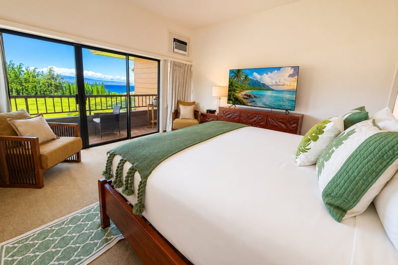 King bedroom with ocean views and private lanai access
