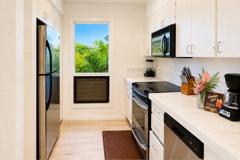 Galley kitchen fully equipped for home-cooked island meals