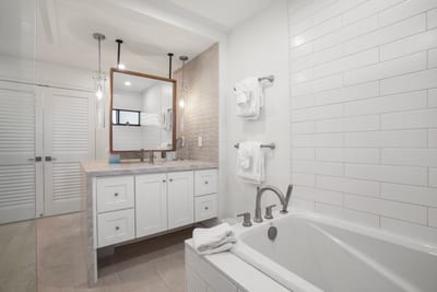 Built-in niches offer convenient space for soaps and toiletries without interrupting the clean lines of the design KRV-2823