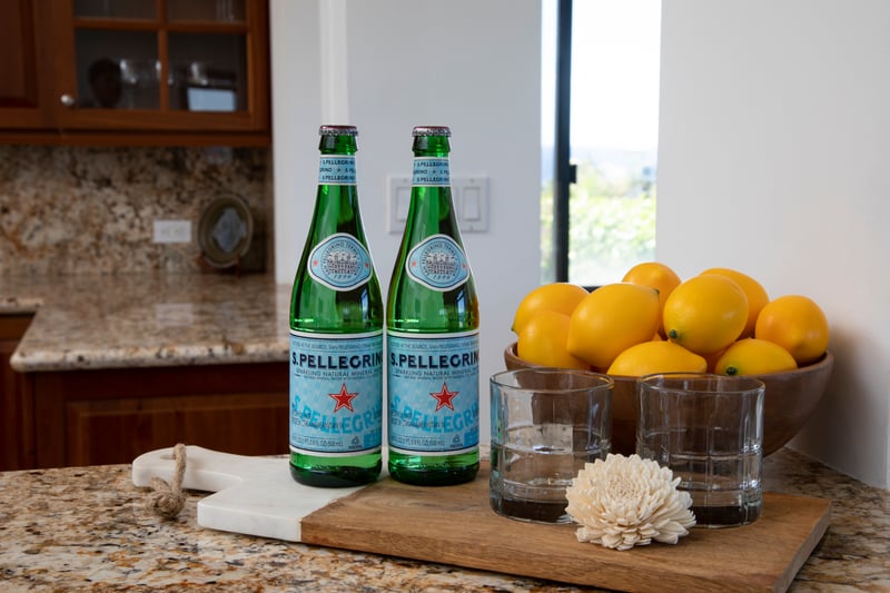 A touch of Italian luxury awaits—enjoy complimentary San Pellegrino and sun-kissed lemons during your stay