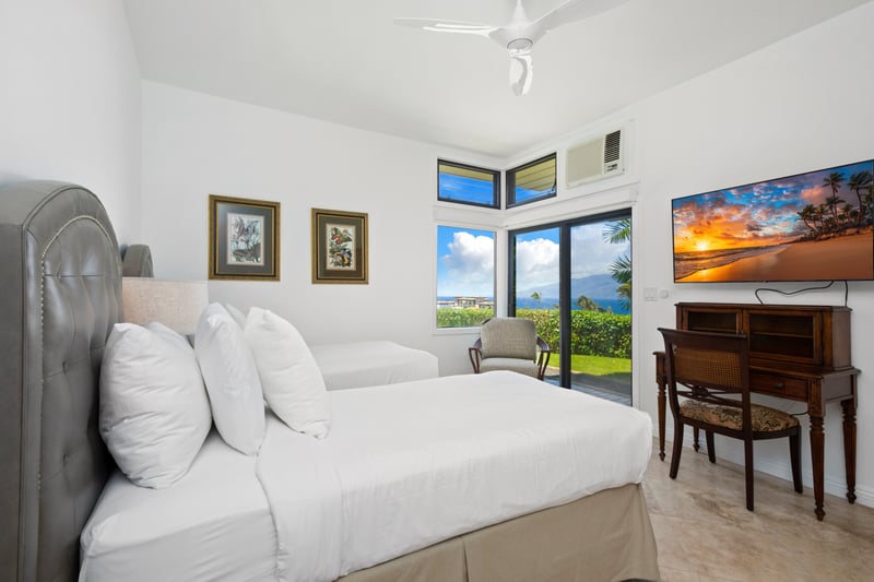 Each detail whispers calm — from the sculpted beds to the golden island light dancing through the windows