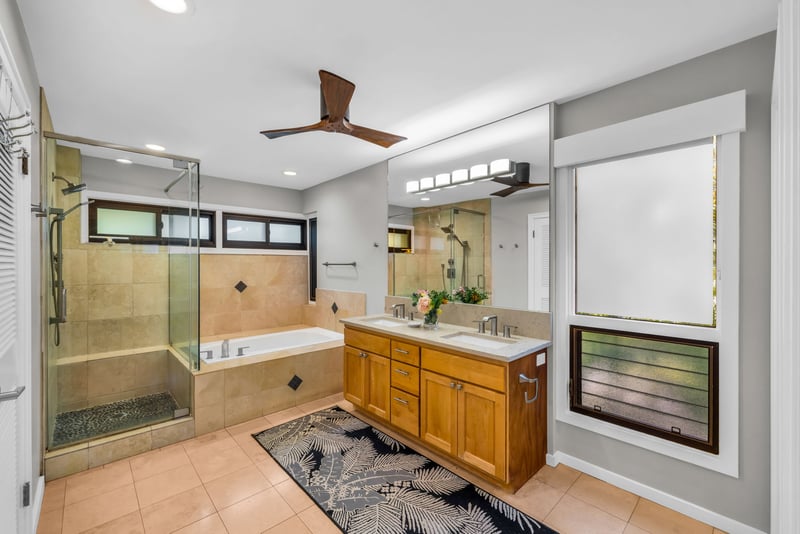 The spacious primary bath features a dual vanity for added convenience KRV-311
